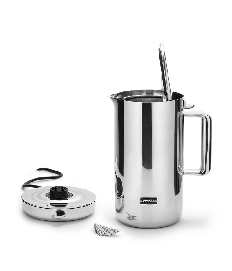 Aarke Stainless Steel Kettle. Base beside the open kettle.